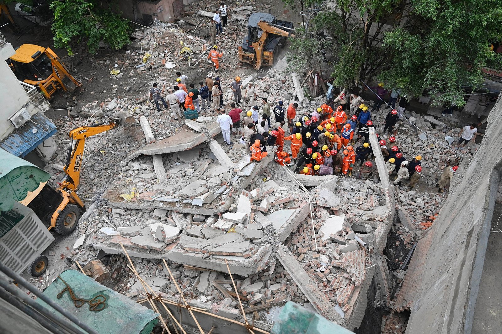 NDRF teams conduct search and rescue operations amid concrete debris